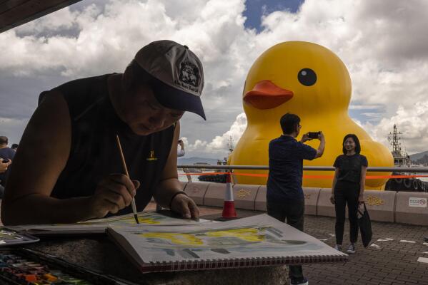 Giant inflatable ducks make a splash in Hong Kong as pop-art